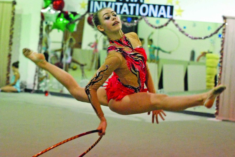 Junior Nicky Wojtania rehearses her rhythmic gymnastics routine in preparation fir an upcoming competition.