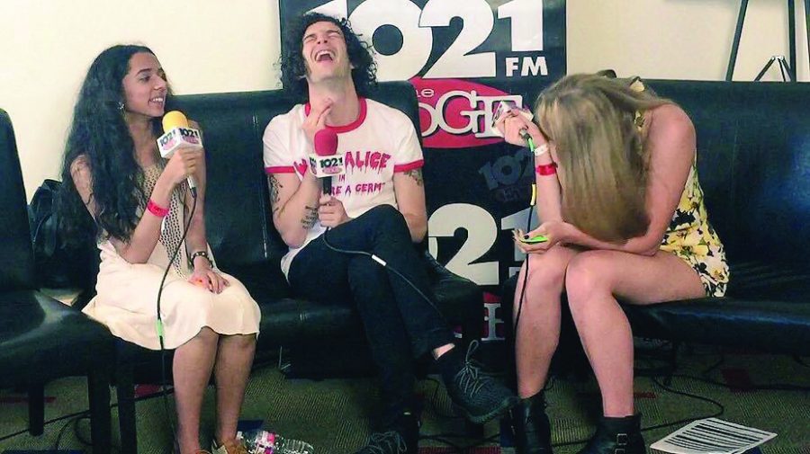Sattar (far left) interview Matthew "Matty" Healy (center), the lead singer of English rock band The 1975.