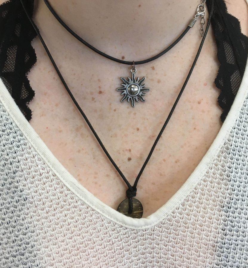 A student wearing a statement choker.