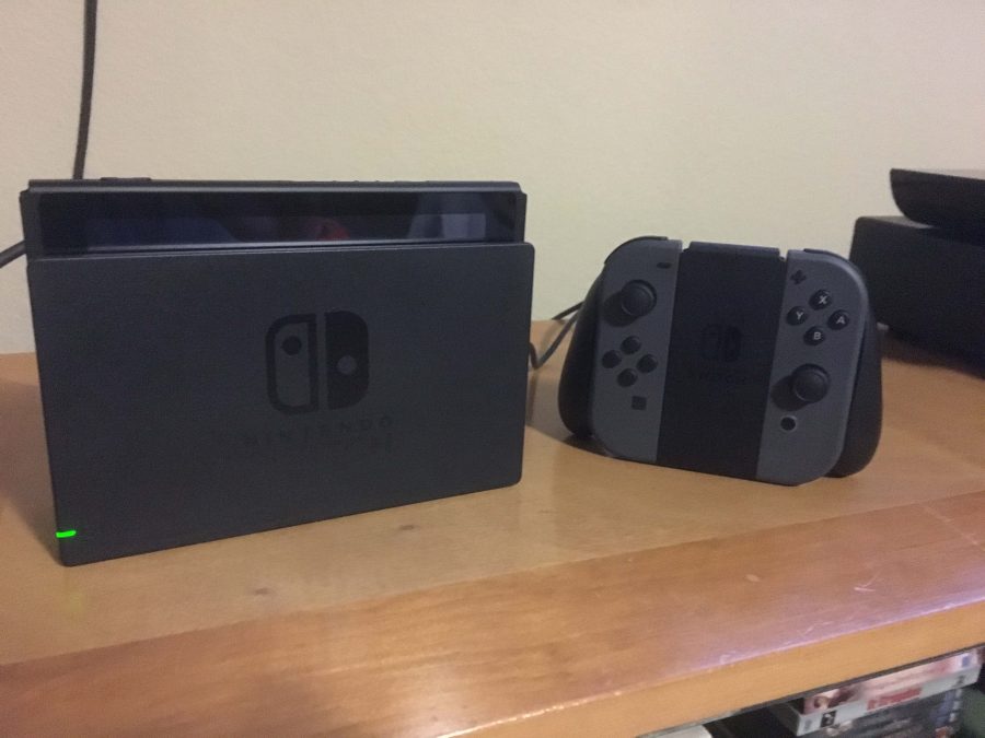 On display: The new portable Nintendo Switch console comes with two detachable remotes.