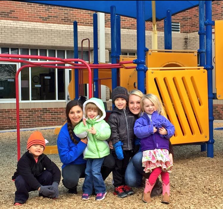 Playing with preschool students, juniors Alex Arkwright and Allison Knubowitz use the skills they learned in their Education and Training class.