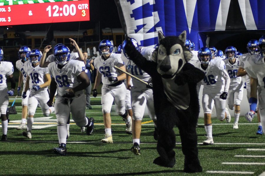 Plano West runs out of the tunnel against Plano Senior on Friday, September 28, 2018 at Clark Stadium.