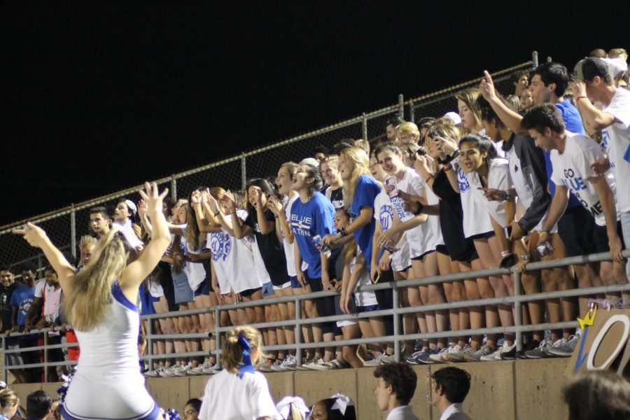 Plano West students cheer on the football team in a game against Plano Senior.