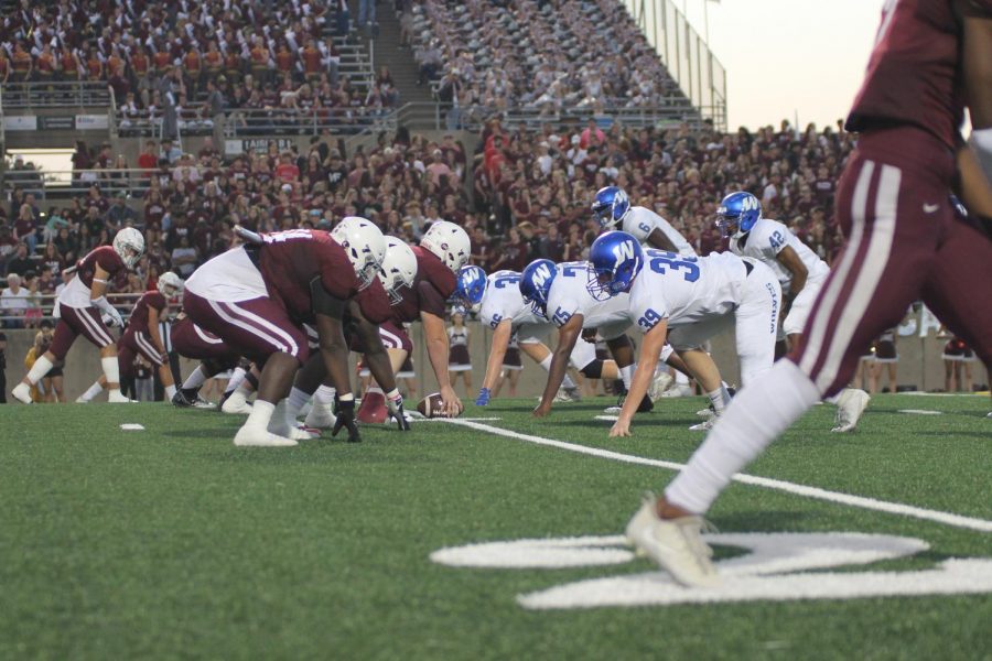 Plano West prepares to stop the Wildcat offense.
