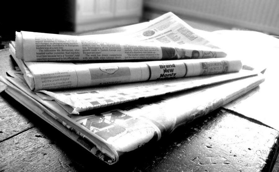 "Newspapers B&W (4)" by NS Newsflash is licensed under CC BY 2.0