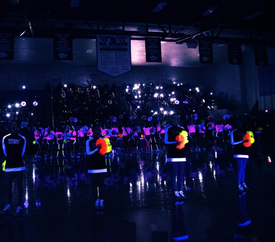 Plano West Royales and Cheerleaders perform during the Black Out Pep Rally